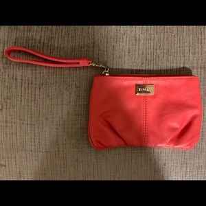 Red clutch bag great for going out can hold Phone.